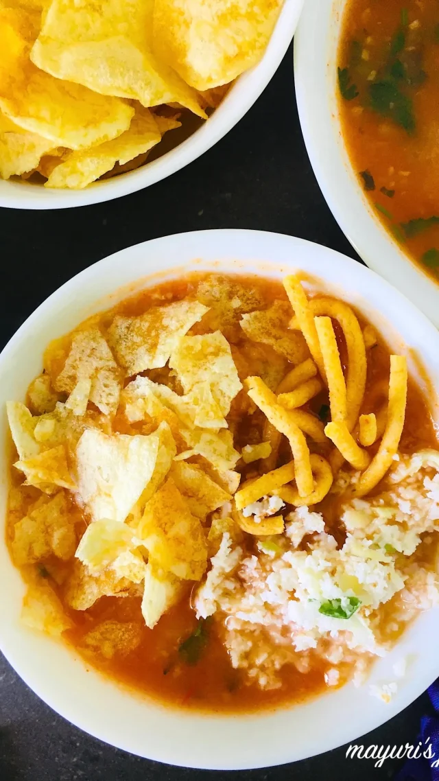 KACHRI BATETA \| KACHRI BABU Kachri Bateta/ Kachri Babu is a tangy, lip smacking spicy potato stew served with a dry coconut mango chutney and topped with ganthia and crushed potato crisps or chips. \#kenyanfood \#streetfood \#potatoes \#vegetarianfood \#kachribateta PRINTABLE RECIPE: Kachri Bateta/ Babu Kachri - Mayuri’s Jikoni INGREDIENTS REQUIRED FOR KACHRI BATETA SERVES 6 FOR THE POTATO STEW: \* 5-6 medium potatoes \* 1 tbsp garlic paste \* ¼ cup fresh fenugreek or coriander washed and chopped \* ½ -1 tsp red chilli powder \* 2 cups tomato puree \* 1½ tsps salt \* 4 cups water \* ½ cup raw mango grated \* 1 tbsp oil FOR THE COCONUT MANGO CHUTNEY: \* 2 cups fresh coconut finely grated \* ½ cup raw mango finely grated \* ½ - 1 tsp green chilli paste \* ¼ tsp salt TO SERVE: \* 250 g thick sev/tikha ganthia \* 500 g potato crisps or chips